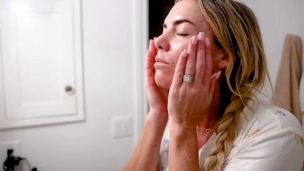 Katie from Love Sweat Fitness applying castor oil every night.