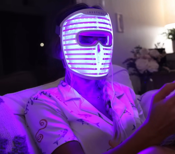 Katie from Love Sweat Fitness wears iRestore Illumina face mask